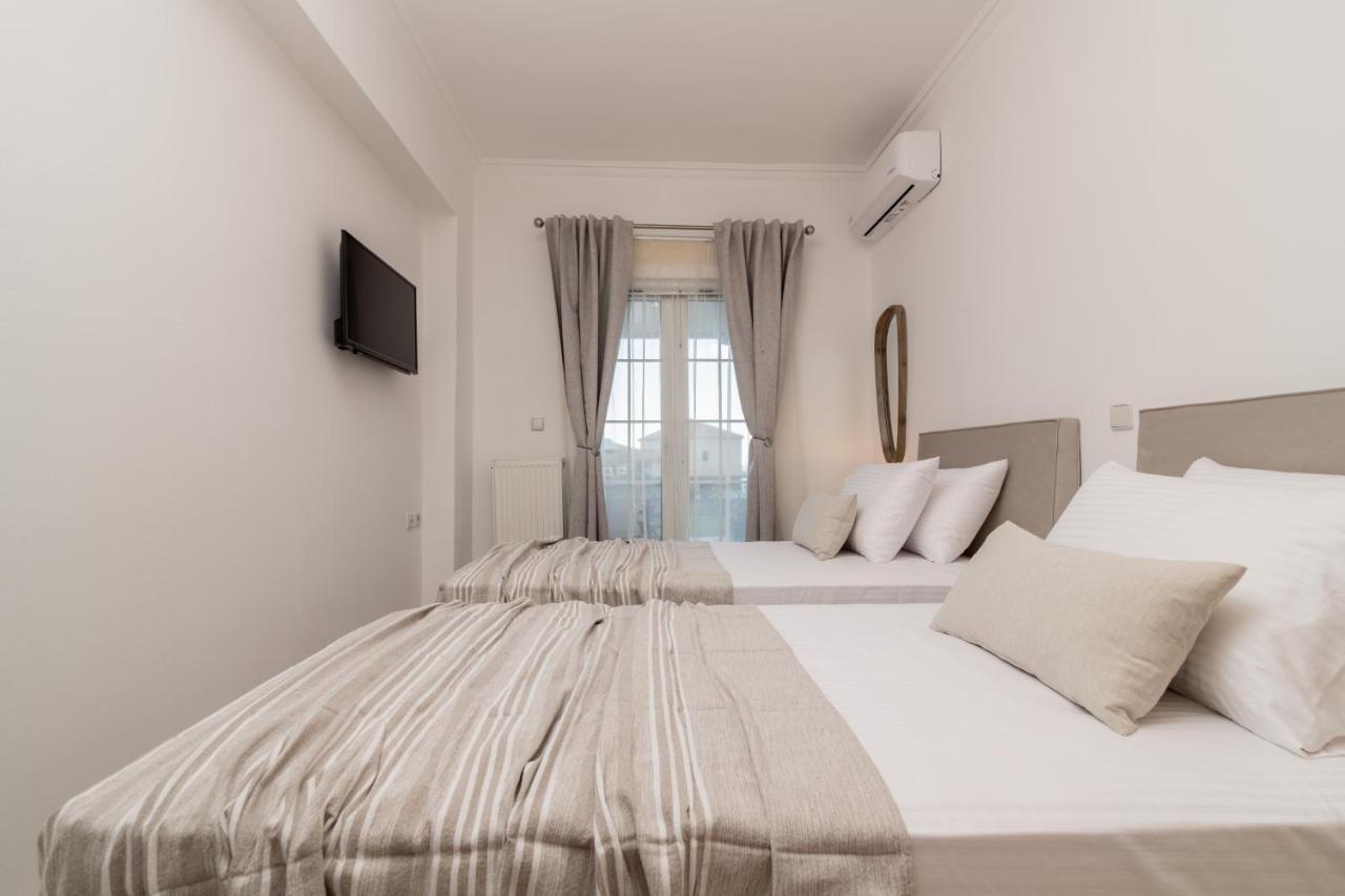 Swan Apartments Планос Экстерьер фото